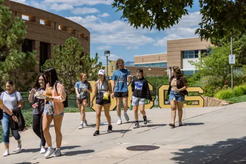 students walking on campus