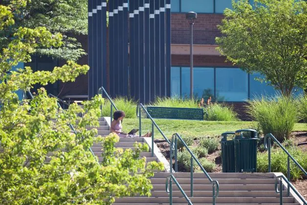 UCCS Student on Engineering Stairs