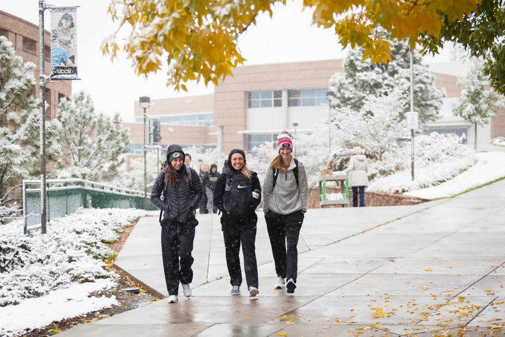 Students walking on the spine